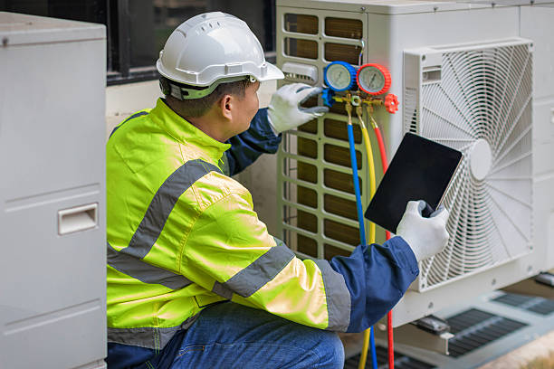Professional Hvac Maintenance technician working in Russell, IL